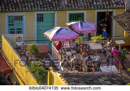"View from the bell tower of the church Convento de San Francisco de Asis onto a terrace, Trinidad, Sancti Spiritus Province, Cuba, North America" View Large Photo Image Stock Photography - "View from the bell tower of the church Convento de San Francisco de Asis onto a terrace, Trinidad, Sancti Spiritus Province, Cuba, North America". Fotosearch