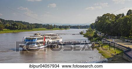 Picture - "View from the Blue Wonder or Loschwitzer Brucke Bridge on the pier with excursion ship """"Grafin Cosel"""", Dresden, Saxony, Germany, Europe". Fotosearch