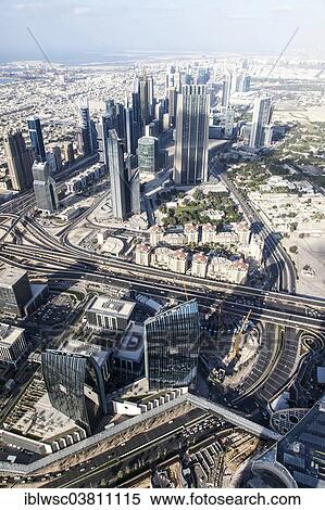 "View from the Burj Khalifa on skyscrapers on Sheikh Zayed Road, Dubai, United Arab Emirates, Asia" View Large Photo Image Stock Photography - "View from the Burj Khalifa on skyscrapers on Sheikh Zayed Road, Dubai, United Arab Emirates, Asia". Fotosearch