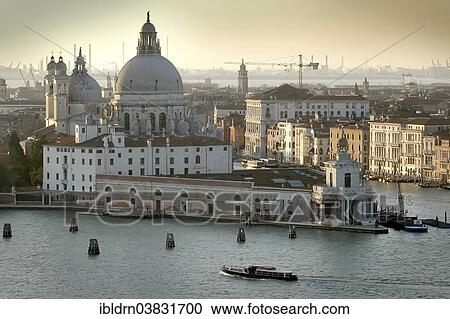 Stock Image - "View from the Church of San Giorgio Maggiore across the Canale della Giudecca towards the Church of Santa Maria della Salute, Venice, Veneto, Italy, Europe". Fotosearch