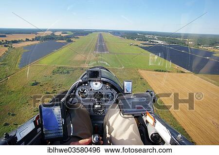 "View from the cockpit of a glider, landing approach at the Rothenburg airfield in Upper Lusatia, Rothenburg, Saxony, Germany, Europe" View Large Photo Image Stock Photograph - "View from the cockpit of a glider, landing approach at the Rothenburg airfield in Upper Lusatia, Rothenburg, Saxony, Germany, Europe". Fotosearch