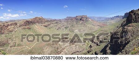 "View from the Mirador de Fataga of Mt Barranco de Fataga, Gran Canaria, Canary Islands, Spain, Europe" View Large Photo Image Stock Image - "View from the Mirador de Fataga of Mt Barranco de Fataga, Gran Canaria, Canary Islands, Spain, Europe". Fotosearch