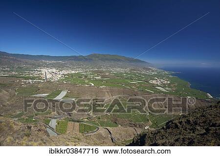 "View from the Mirador El Time towards Tazacorte and Los Llanos de Aridane, La Palma, Canary Islands, Spain, Europe" View Large Photo Image Stock Photograph - "View from the Mirador El Time towards Tazacorte and Los Llanos de Aridane, La Palma, Canary Islands, Spain, Europe". Fotosearch