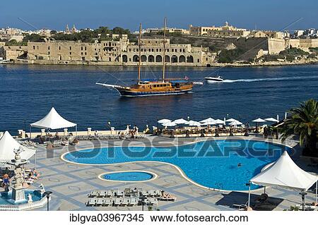 "View from the pool area of? Çï? Çïthe Grand Hotel Excelsior Malta of Marsamxett Harbour, Valletta, Malta, Europe" View Large Photo Image Stock Photography - "View from the pool area of? Çï? Çïthe Grand Hotel Excelsior Malta of Marsamxett Harbour, Valletta, Malta, Europe". Fotosearch