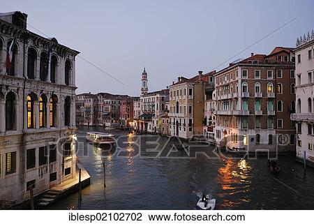 Stock Image - "View from the Rialto Bridge to the Grand Canal, Canal Grande, in the direction of the Santi Apostoli church, Palazzo dei Camerlenghi, Palazzo Civran, Palazzo Sernagiotto, Venice, Venezia, Veneto, Italy, Europe". Fotosearch
