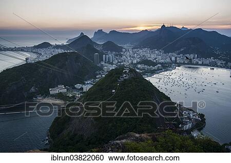 Stock Image - "View from the Sugarloaf Mountain or Pao de Acucar and the famous cable car, Rio de Janeiro, Brazil, South America". Fotosearch
