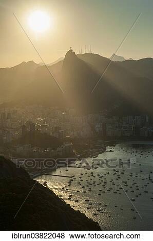 Stock Photo - "View from the Sugarloaf Mountain or Pao de Acucar at sunset, Rio de Janeiro, Brazil, South America". Fotosearch