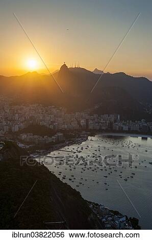 Stock Photograph - "View from the Sugarloaf Mountain or Pao de Acucar at sunset, Rio de Janeiro, Brazil, South America". Fotosearch