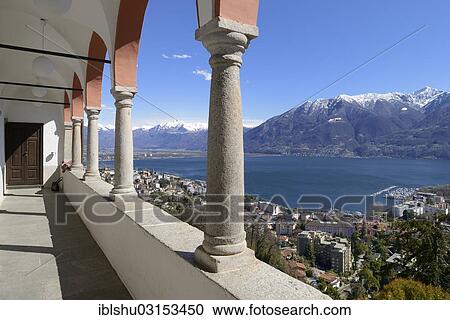 Stock Image - "View from the terrace of the Sanctuary of the Madonna del Sasso or Our Lady of the Rock over Locarno and Lake Maggiore, Orselina, Locarno, Kanton Tessin, Switzerland, Europe". Fotosearch