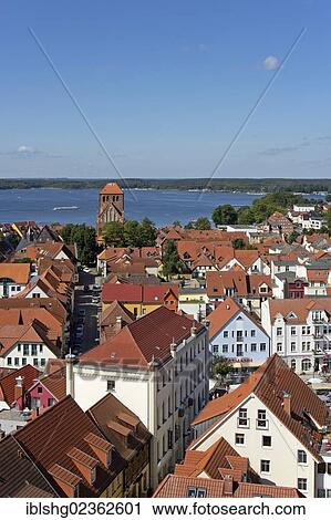 "View from the tower of St. Mary's Church, Waren, Mecklenburg Lake District, Mecklenburg-Western Pomerania, Germany, Europe" View Large Photo Image Stock Image - "View from the tower of St. Mary's Church, Waren, Mecklenburg Lake District, Mecklenburg-Western Pomerania, Germany, Europe". Fotosearch