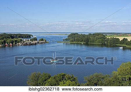"View from the tower of St Mary's Church towards Lake Mueritz, Roebel, Mecklenburg Lake District, Mecklenburg-Western Pomerania, Germany, Europe" View Large Photo Image Stock Photo - "View from the tower of St Mary's Church towards Lake Mueritz, Roebel, Mecklenburg Lake District, Mecklenburg-Western Pomerania, Germany, Europe". Fotosearch