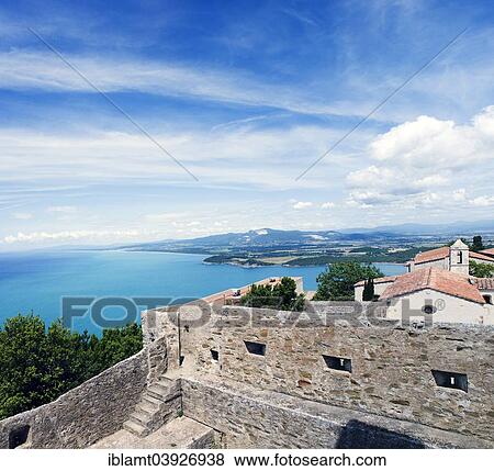 "View from Torre di Populonia of Populonia Castle and the Gulf of Baratti, Populonia, Province of Livorno, Tuscany, Italy, Europe" View Large Photo Image Stock Photo - "View from Torre di Populonia of Populonia Castle and the Gulf of Baratti, Populonia, Province of Livorno, Tuscany, Italy, Europe". Fotosearch