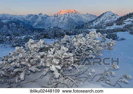 "View from Torrener Joch pass towards the mountains of Jenner, Watzmann, Hundstod and the Steinernes Meer plateau, Berchtesgadener Land, Bavaria, Germany, Europe" View Large Photo Image Stock Photo - "View from Torrener Joch pass towards the mountains of Jenner, Watzmann, Hundstod and the Steinernes Meer plateau, Berchtesgadener Land, Bavaria, Germany, Europe". Fotosearch