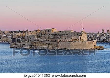 "View from Valletta of the fortress Fort St. Angelo in the centre of the Grand Harbour, Vittoriosa, Malta, Europe" View Large Photo Image Stock Image - "View from Valletta of the fortress Fort St. Angelo in the centre of the Grand Harbour, Vittoriosa, Malta, Europe". Fotosearch