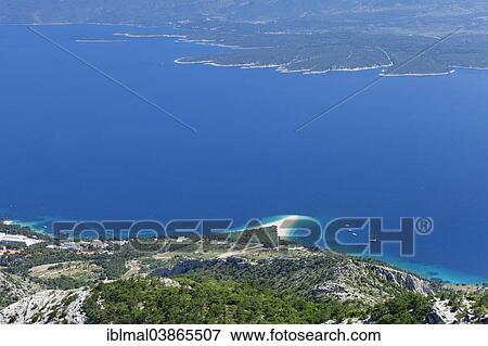 "View from Vidova Gora on the town of Bol, Zlatni Rat or Golden Horn and the island of Hvar at the back, island of Brac, Dalmatia, Croatia, Europe" View Large Photo Image Stock Photo - "View from Vidova Gora on the town of Bol, Zlatni Rat or Golden Horn and the island of Hvar at the back, island of Brac, Dalmatia, Croatia, Europe". Fotosearch