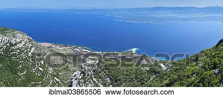 "View from Vidova Gora on the town of Bol, Zlatni Rat or Golden Horn and the island of Hvar at the back, island of Brac, Dalmatia, Croatia, Europe" View Large Photo Image Stock Photograph - "View from Vidova Gora on the town of Bol, Zlatni Rat or Golden Horn and the island of Hvar at the back, island of Brac, Dalmatia, Croatia, Europe". Fotosearch
