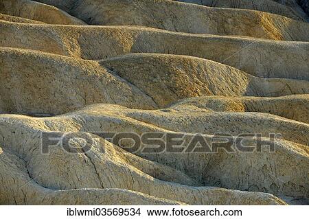 "View from Zabriskie Point over eroded rock formations discoloured by minerals, evening light, Death Valley National Park, Mojave Desert, California, United States, North America" View Large Photo Image Picture - "View from Zabriskie Point over eroded rock formations discoloured by minerals, evening light, Death Valley National Park, Mojave Desert, California, United States, North America". Fotosearch