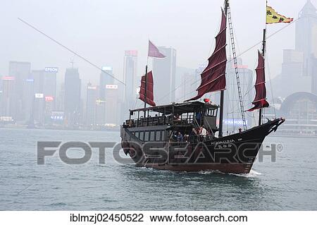 "View of a boat in the bay of Victoria Harbour and Hong Kong Island, in the evening, Hong Kong, China, Asia" View Large Photo Image Stock Image - "View of a boat in the bay of Victoria Harbour and Hong Kong Island, in the evening, Hong Kong, China, Asia". Fotosearch