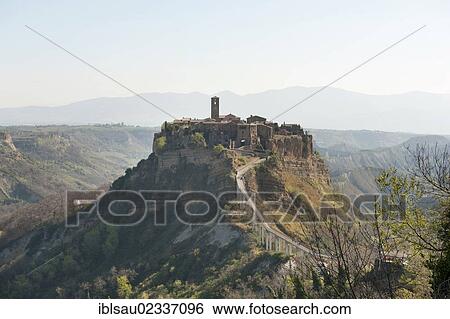 Stock Photograph - "View of a mountain and the village of Civita di Bagnoregio, the dying village, Lazio, Italy, Southern Europe, Europe". Fotosearch