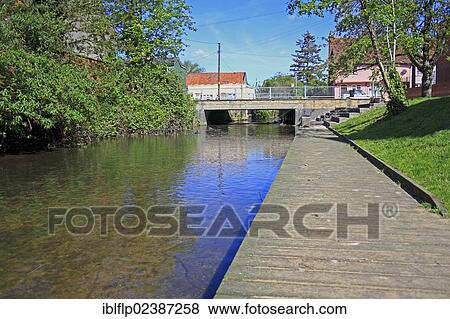 "View of boardwalk alongside river in town, River Gipping, Stowmarket, Suffolk, England, United Kingdom, Europe" View Large Photo Image Stock Photo - "View of boardwalk alongside river in town, River Gipping, Stowmarket, Suffolk, England, United Kingdom, Europe". Fotosearch