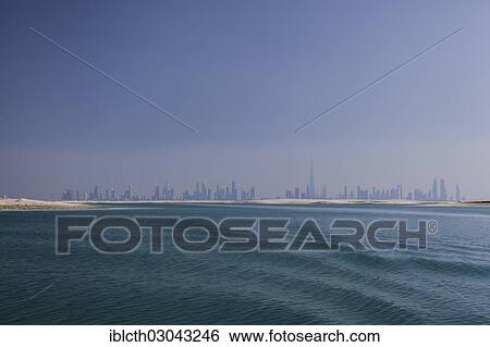 "View of Dubai from the artificial archipelago """"The World"""" or """"World Islands"""", Dubai, Emirate of Dubai, United Arab Emirates, Asia" View Large Photo Image Stock Photograph - "View of Dubai from the artificial archipelago """"The World"""" or """"World Islands"""", Dubai, Emirate of Dubai, United Arab Emirates, Asia". Fotosearch