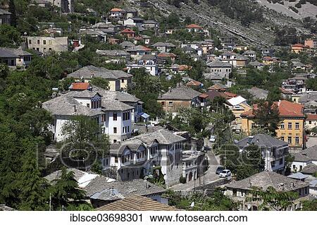 "View of Gjirokastra with typical stone covered roofs, UNESCO World Heritage Site, Gjirokaster, Gjirokaster County, Albania, Europe" View Large Photo Image Stock Image - "View of Gjirokastra with typical stone covered roofs, UNESCO World Heritage Site, Gjirokaster, Gjirokaster County, Albania, Europe". Fotosearch
