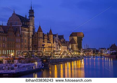 Stock Image - "View of historic houses on the canal seen from Stagiewna bridge, ÅšrodmieÅ›cie, Gdansk, Pomeranian Voivodeship, Poland, Europe". Fotosearch