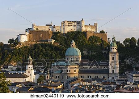 "View of Hohensalzburg Castle, Neue Residenz palace, the tower with the glockenspiel and Salzburg Cathedral as seen from Kapuzinerberg mountain, Salzburg, Austria, Europe, PublicGround, Europe" View Large Photo Image Stock Photo - "View of Hohensalzburg Castle, Neue Residenz palace, the tower with the glockenspiel and Salzburg Cathedral as seen from Kapuzinerberg mountain, Salzburg, Austria, Europe, PublicGround, Europe". Fotosearch