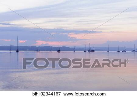 "View of Lake Starnberg near St. Heinrich in the evening light, Upper Bavaria, Bavaria, Germany, Europe, PublicGround, Europe" View Large Photo Image Stock Photo - "View of Lake Starnberg near St. Heinrich in the evening light, Upper Bavaria, Bavaria, Germany, Europe, PublicGround, Europe". Fotosearch