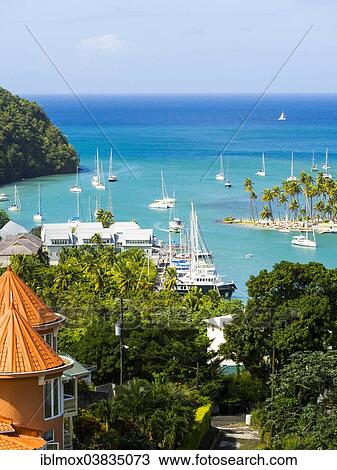 "View of Marigot Bay with yachts, Castries, St. Lucia island, Lesser Antilles, Windward Islands, St. Lucia" View Large Photo Image Stock Image - "View of Marigot Bay with yachts, Castries, St. Lucia island, Lesser Antilles, Windward Islands, St. Lucia". Fotosearch