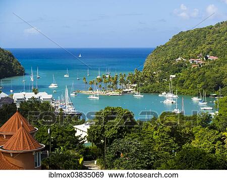 "View of Marigot Bay with yachts, Castries, St. Lucia island, Lesser Antilles, Windward Islands, St. Lucia" View Large Photo Image Stock Photo - "View of Marigot Bay with yachts, Castries, St. Lucia island, Lesser Antilles, Windward Islands, St. Lucia". Fotosearch