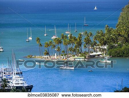 "View of Marigot Bay with yachts, Castries, St. Lucia island, Lesser Antilles, Windward Islands, St. Lucia" View Large Photo Image Stock Photo - "View of Marigot Bay with yachts, Castries, St. Lucia island, Lesser Antilles, Windward Islands, St. Lucia". Fotosearch