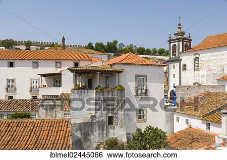 Stock Photograph - "View of Obidos with Igreja de Sao Pedro, St Peters Church, from the city wall, Castelo de Obidos, Obidos Castle, Obidos, Leiria District, Pinhal Litoral, Portugal, Europe". Fotosearch