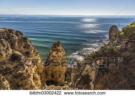 "View of Praia do Camilo as seen from Ponta da Piedade, coastal landscape, Algarve, Lagos, Algarve, Portugal, Europe" View Large Photo Image Stock Image - "View of Praia do Camilo as seen from Ponta da Piedade, coastal landscape, Algarve, Lagos, Algarve, Portugal, Europe". Fotosearch