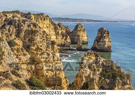 "View of Praia do Camilo as seen from Ponta da Piedade, coastal landscape, Algarve, Lagos, Algarve, Portugal, Europe" View Large Photo Image Stock Image - "View of Praia do Camilo as seen from Ponta da Piedade, coastal landscape, Algarve, Lagos, Algarve, Portugal, Europe". Fotosearch