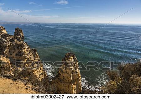 "View of Praia do Camilo as seen from Ponta da Piedade, coastal landscape, Algarve, Lagos, Algarve, Portugal, Europe" View Large Photo Image Stock Photo - "View of Praia do Camilo as seen from Ponta da Piedade, coastal landscape, Algarve, Lagos, Algarve, Portugal, Europe". Fotosearch