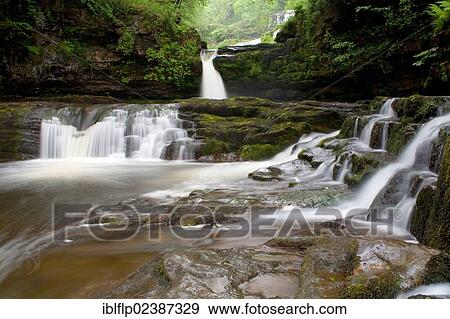 "View of river with cascades and waterfalls, Horseshoe Falls, River Neath, Vale of Neath, Brecon Beacons, South Wales, United Kingdom, Europe" View Large Photo Image Stock Photo - "View of river with cascades and waterfalls, Horseshoe Falls, River Neath, Vale of Neath, Brecon Beacons, South Wales, United Kingdom, Europe". Fotosearch
