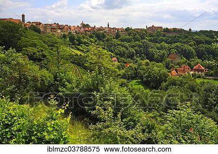 "View of Rothenburg, bushes, and forest, Rothenburg ob der Tauber, Middle Franconia, Bavaria, Germany, Europe" View Large Photo Image Stock Photography - "View of Rothenburg, bushes, and forest, Rothenburg ob der Tauber, Middle Franconia, Bavaria, Germany, Europe". Fotosearch