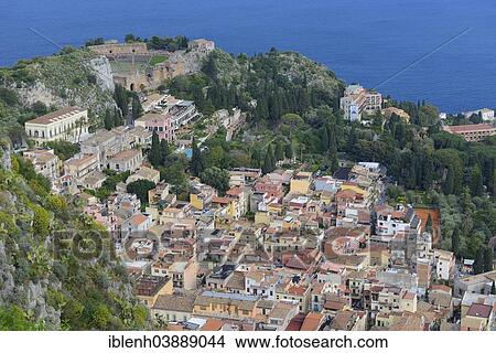 "View of Taormina with the Teatro Greco, Greek Theatre, Taormina, Province of Messina, Sicily, Italy, Europe" View Large Photo Image Picture - "View of Taormina with the Teatro Greco, Greek Theatre, Taormina, Province of Messina, Sicily, Italy, Europe". Fotosearch