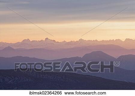 Stock Photograph - "View of the Alps from Mont Ventoux, looking northeast at sunrise, from the Du Mont Serein ski station, Malaucene, Vaison-la-Romaine, Provence region, Departement Vaucluse, France, Europe". Fotosearch