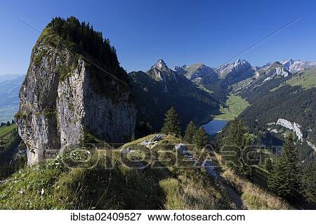 "View of the Alpstein mountain group, lake Saemtisersee and the Rhine Valley as seen from Hoher Kasten mountain, Alpstein, Switzerland, Europe" View Large Photo Image Stock Photo - "View of the Alpstein mountain group, lake Saemtisersee and the Rhine Valley as seen from Hoher Kasten mountain, Alpstein, Switzerland, Europe". Fotosearch