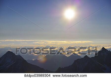 "View of the Austrian Alps from Mt Schrankogel across Mt Ruderhofspitze, Mt Ostliche Seespitze and Mt Habicht up to Mt Grossglockner in the back, near Gries, Tyrol, Austria, Europe" View Large Photo Image Picture - "View of the Austrian Alps from Mt Schrankogel across Mt Ruderhofspitze, Mt Ostliche Seespitze and Mt Habicht up to Mt Grossglockner in the back, near Gries, Tyrol, Austria, Europe". Fotosearch