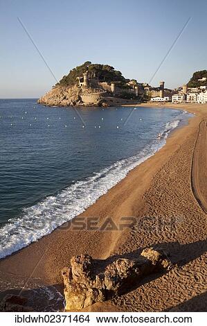Picture - "View of the beach and the Villa Vela, the historic district, in the morning light, Tossa de Mar, Costa Brava, Catalonia, Spain, Europe, PublicGround, Europe". Fotosearch