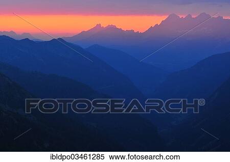 "View of the Bischofsmutzen peaks, left, and the Dachstein range, right, past the Obertal valley in evening light, Schladminger Tauern range, Styria, Austria, Europe" View Large Photo Image Stock Photography - "View of the Bischofsmutzen peaks, left, and the Dachstein range, right, past the Obertal valley in evening light, Schladminger Tauern range, Styria, Austria, Europe". Fotosearch