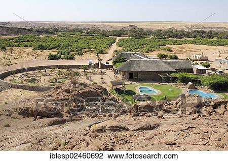 "View of the Brandberg White Lady Lodge and the dry river bed of the Ugab river as seen from a hill, Damaraland, Namibia, Africa" View Large Photo Image Stock Image - "View of the Brandberg White Lady Lodge and the dry river bed of the Ugab river as seen from a hill, Damaraland, Namibia, Africa". Fotosearch