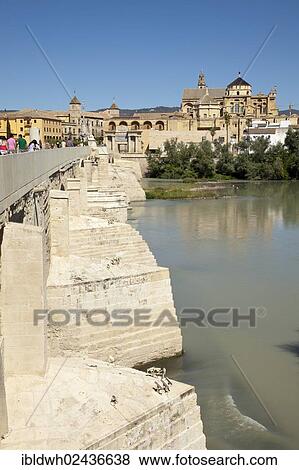 "View of the bridge gate and the Mezquita, Mosque? ÇôCathedral of Cordoba, now a cathedral, formerly a mosque, as seen from the Roman bridge, Cordoba, Andalusia, Spain, Europe, PublicGround, Europe" View Large Photo Image Stock Photo - "View of the bridge gate and the Mezquita, Mosque? ÇôCathedral of Cordoba, now a cathedral, formerly a mosque, as seen from the Roman bridge, Cordoba, Andalusia, Spain, Europe, PublicGround, Europe". Fotosearch