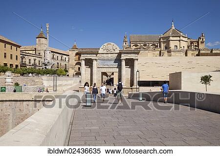 Stock Photography - "View of the bridge gate and the Mezquita, Mosque? ÇôCathedral of Cordoba, now a cathedral, formerly a mosque, as seen from the Roman bridge, Cordoba, Andalusia, Spain, Europe, PublicGround, Europe". Fotosearch