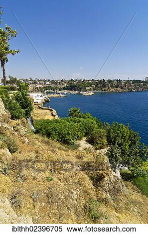 "View of the coastline with the harbour entrance of Antalya, Turkish Riviera, Turkey, Asia Minor, Asia" View Large Photo Image Stock Photography - "View of the coastline with the harbour entrance of Antalya, Turkish Riviera, Turkey, Asia Minor, Asia". Fotosearch
