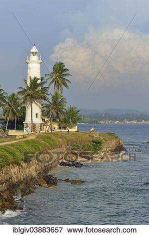 Stock Photo - "View of the fortification wall and the lighthouse, UNESCO World Heritage Site, Galle Fort, Galle, Southern Province, Sri Lanka, Asia". Fotosearch