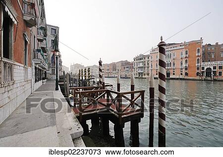 Stock Image - "View of the Grand Canal, Canal Grande, with Palazzo Tiepoletto Passi, Palazzo Soranzo Pisani, Palazzo Tiepolo Passi, Palazzo Pisani Moretta, Palazzo Barbarigo della Terrazza, Venice, Venezia, Veneto, Italy, Europe". Fotosearch